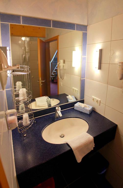 Koupelna v ubytování Hotel-Restaurant Fröhlich