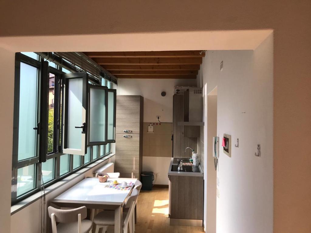 Kuchyň nebo kuchyňský kout v ubytování MyRoom Città Alta 2