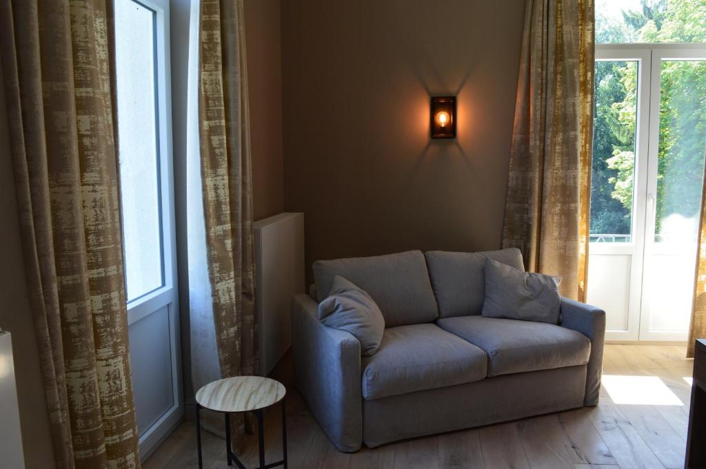 Posezení v ubytování Hotel La Heid des Pairs