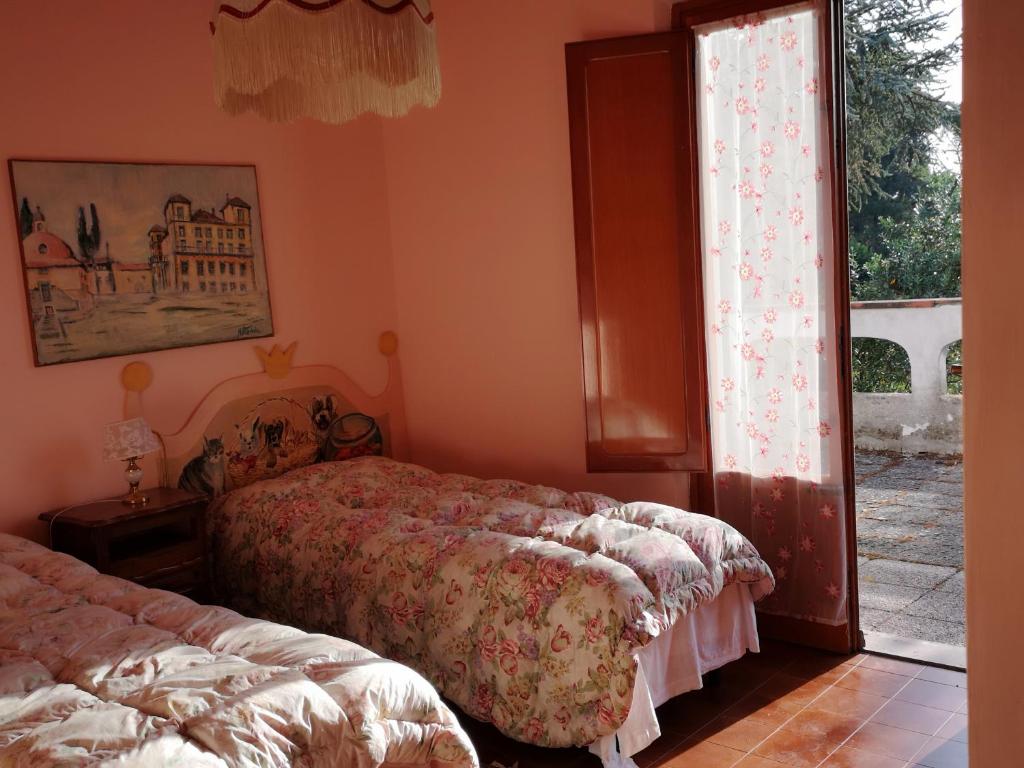 Posteľ alebo postele v izbe v ubytovaní Villa Artemisia