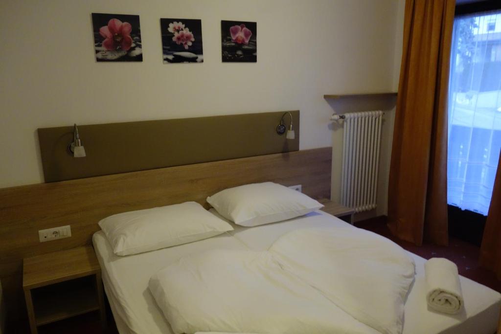 Postel nebo postele na pokoji v ubytování Pension Volgger