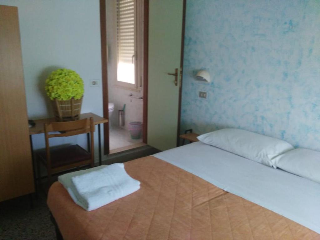 Postel nebo postele na pokoji v ubytování Hotel Acapulco sul mare