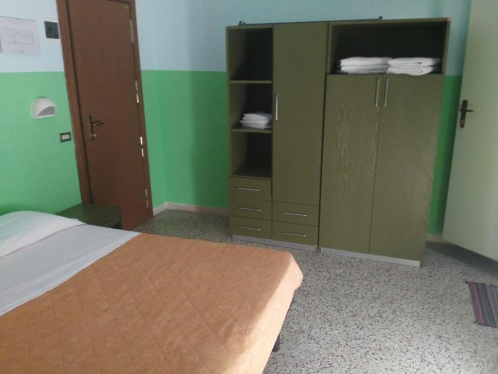 Postel nebo postele na pokoji v ubytování Hotel Acapulco sul mare