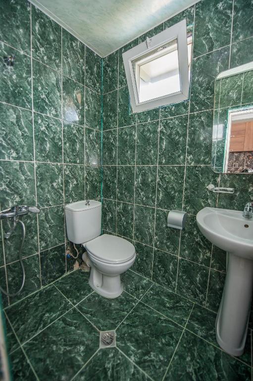 Koupelna v ubytování HOTEL COSMOS