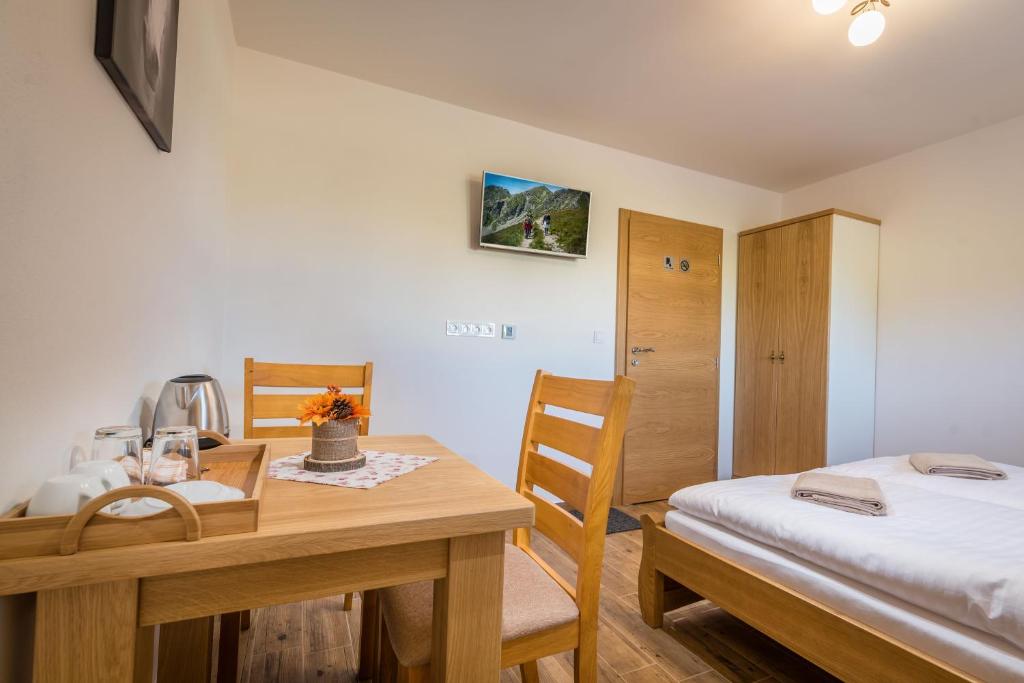 Posteľ alebo postele v izbe v ubytovaní Na Verande apartments Jasna
