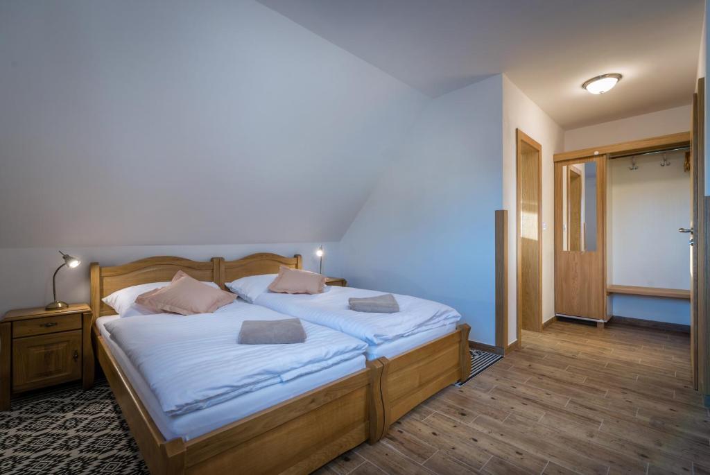 Posteľ alebo postele v izbe v ubytovaní Na Verande apartments Jasna