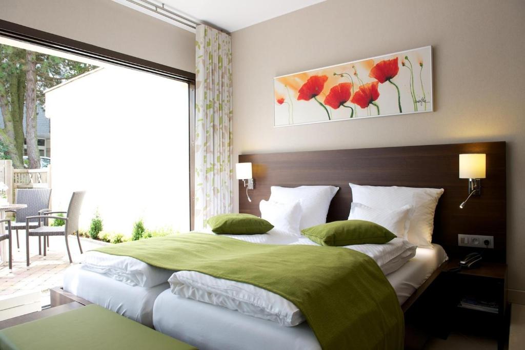 Postel nebo postele na pokoji v ubytování Relax-Hotel Pip-Margraff