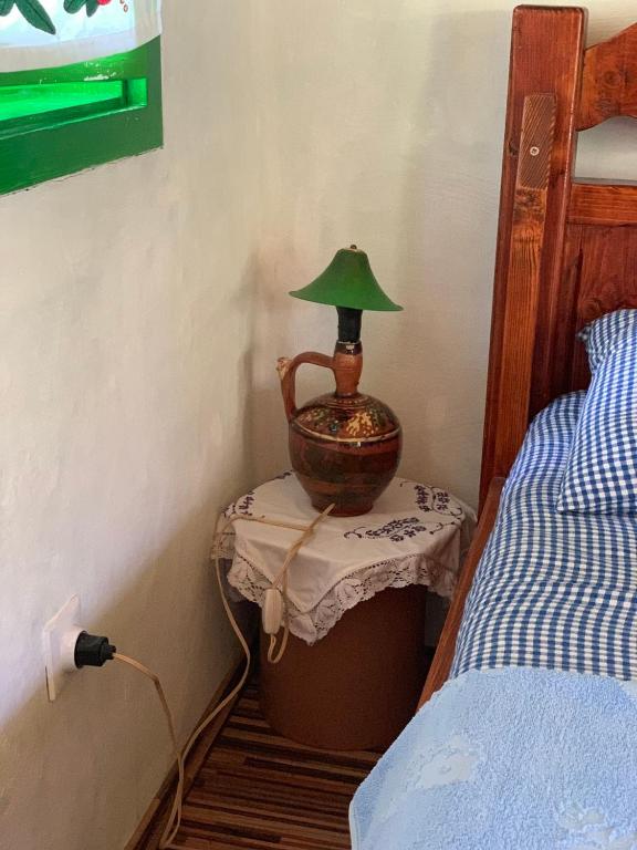 Postel nebo postele na pokoji v ubytování Etno apartman Tajna