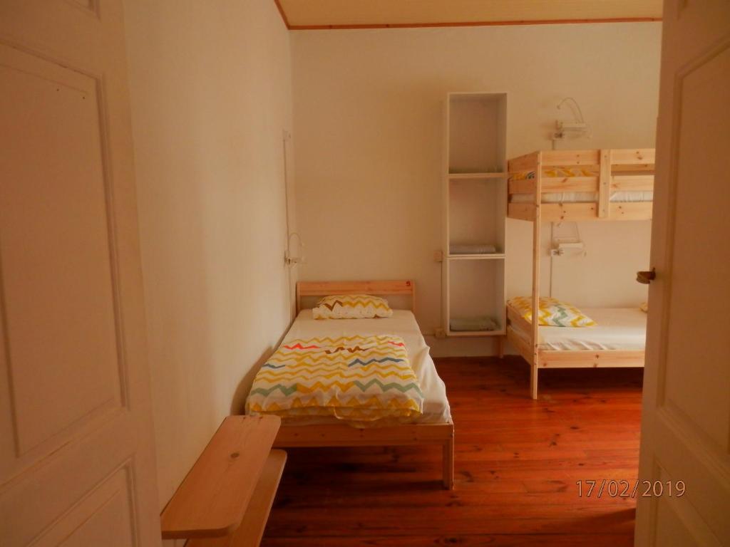A bed or beds in a room at Jacob's Hotel TUI