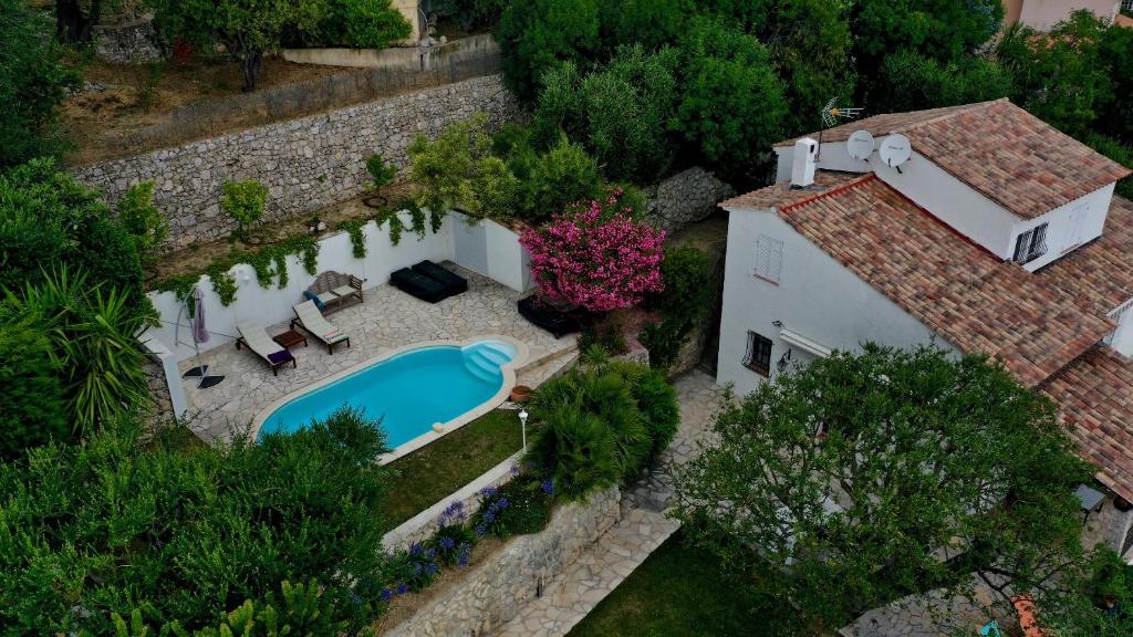 an aerial view of a house with a swimming pool at Monte Carlo View and Spa in La Turbie