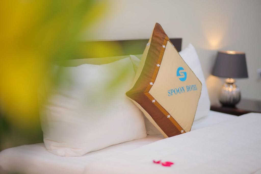 Postel nebo postele na pokoji v ubytování Spoon Hotel
