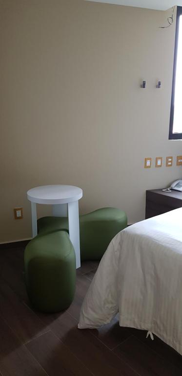 Letto o letti in una camera di Quinto Elemento