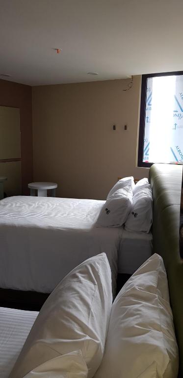Letto o letti in una camera di Quinto Elemento