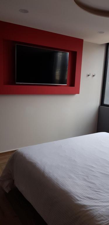 Letto o letti in una camera di Quinto Elemento