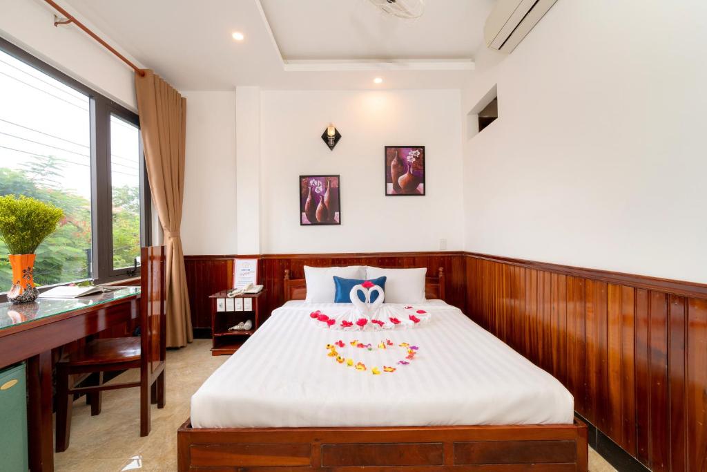 Postel nebo postele na pokoji v ubytování Family Hotel