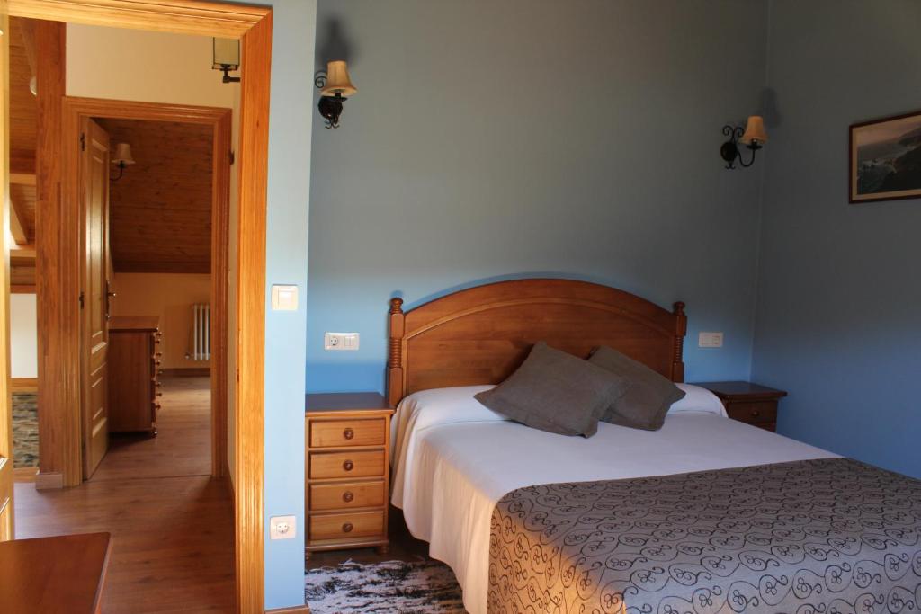 Postel nebo postele na pokoji v ubytování Casa Rural Soutomoro