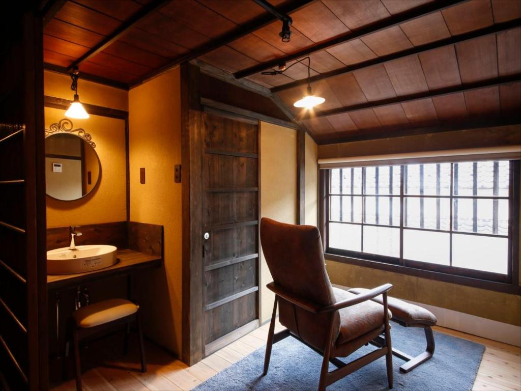 Posezení v ubytování Yamasaki Ryokan Q Nakamonzenya