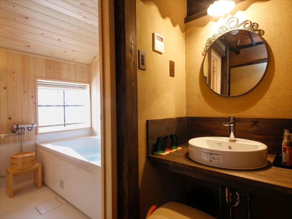 Koupelna v ubytování Yamasaki Ryokan Q Nakamonzenya