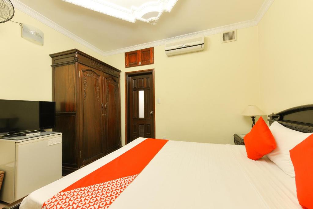 Postel nebo postele na pokoji v ubytování Lucky 2 Hotel & Travel