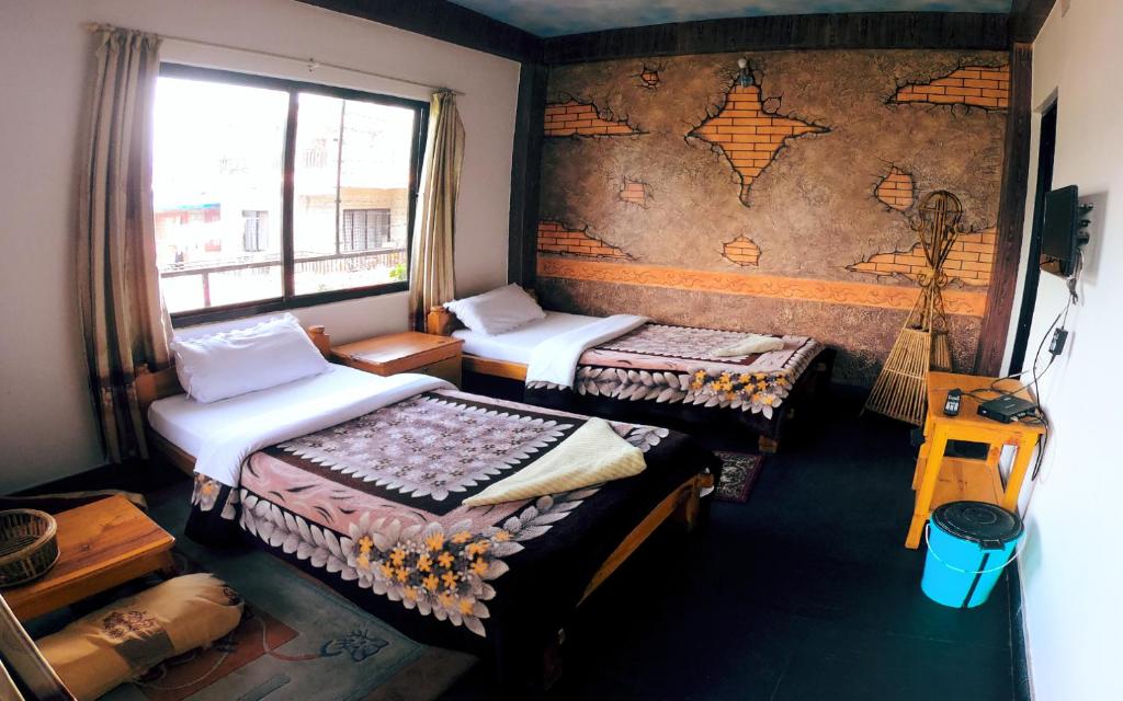 Ліжко або ліжка в номері Hotel Hakoniwa