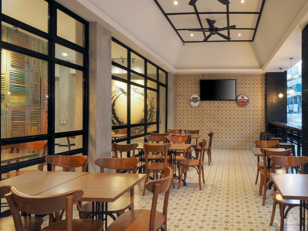TV a/nebo společenská místnost v ubytování Kama Hotel