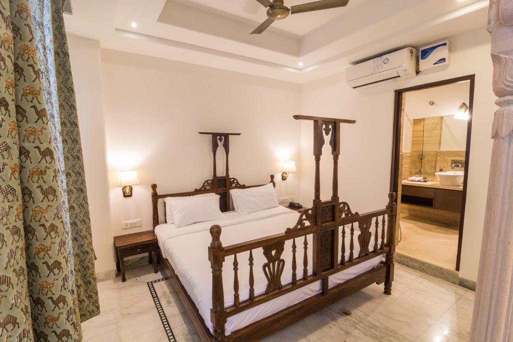 Cama o camas de una habitación en Pandya Niwas