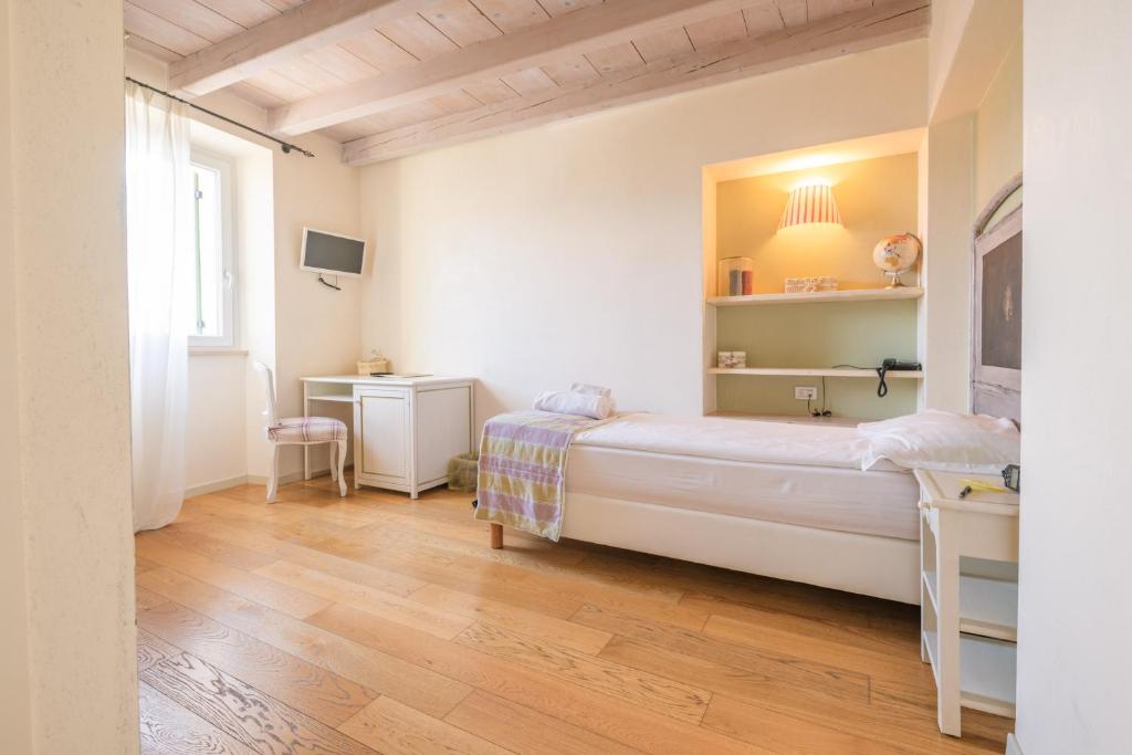 Postel nebo postele na pokoji v ubytování Hotel Villa Moron