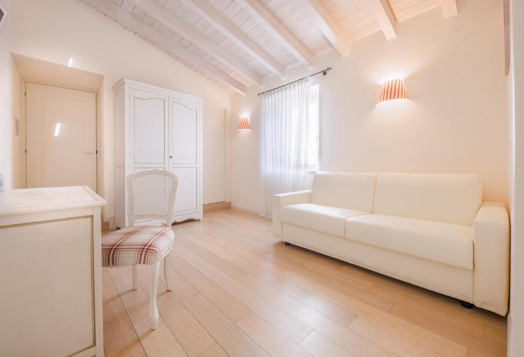 Postel nebo postele na pokoji v ubytování Hotel Villa Moron