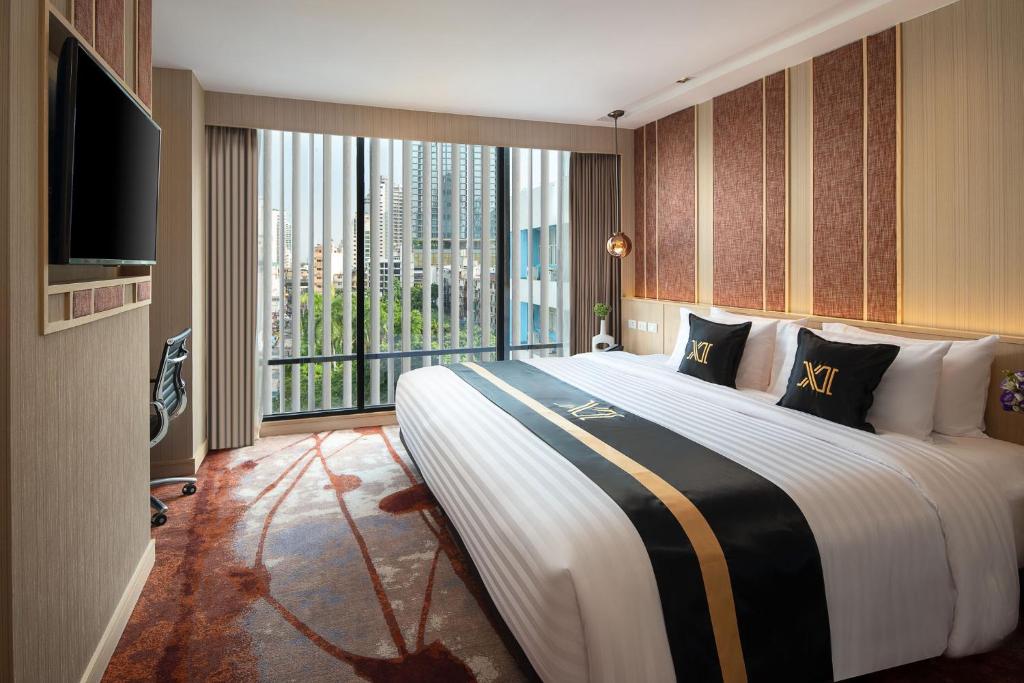 Eleven Hotel Bangkok Sukhumvit 11 - Resim 1