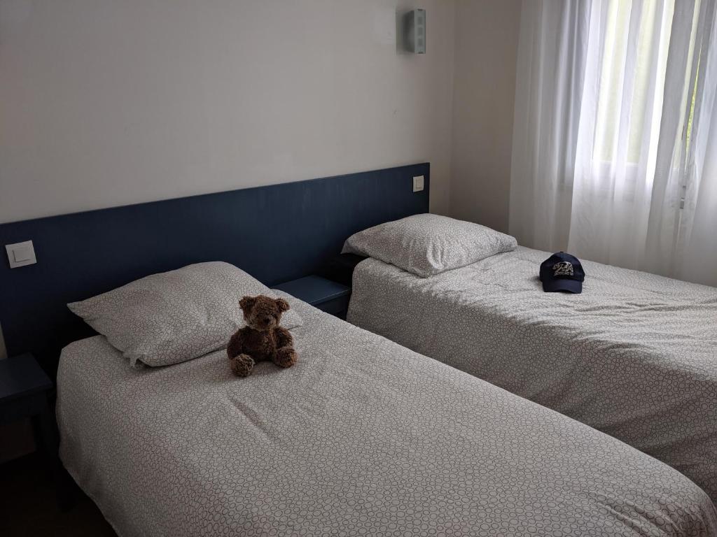Postel nebo postele na pokoji v ubytování T3 pays du piment d'Espelette