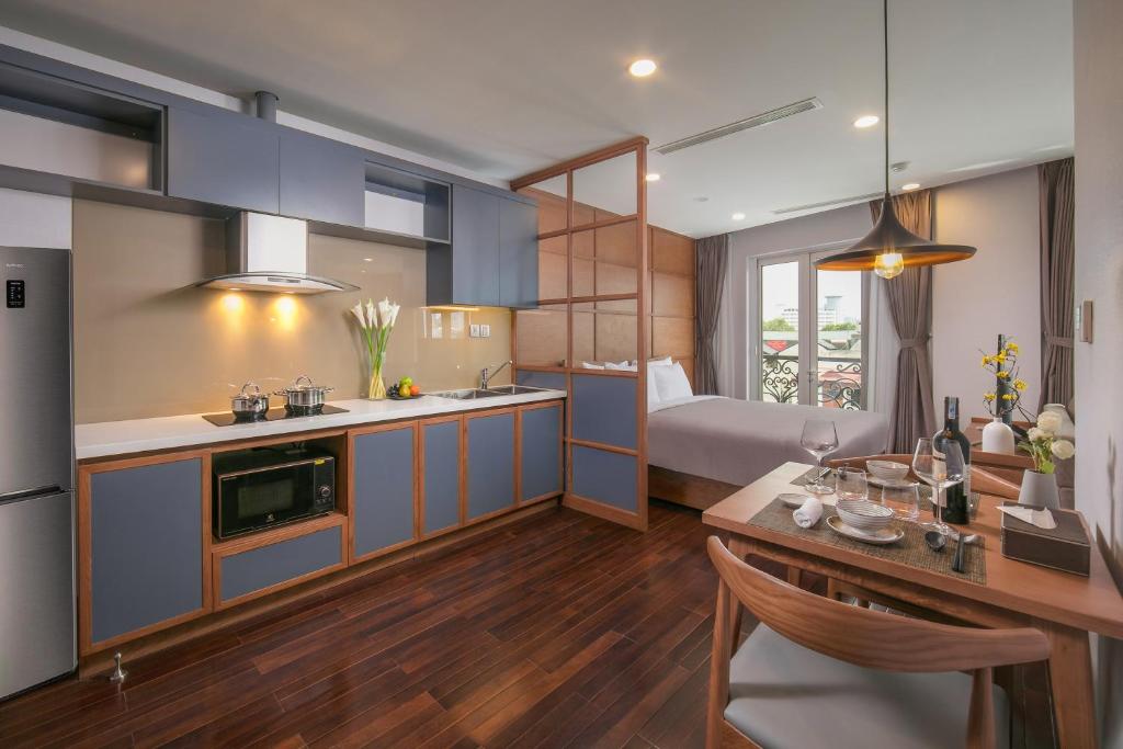 Kuchyň nebo kuchyňský kout v ubytování KEGON Hotel