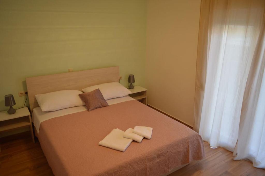 Postel nebo postele na pokoji v ubytování FourM