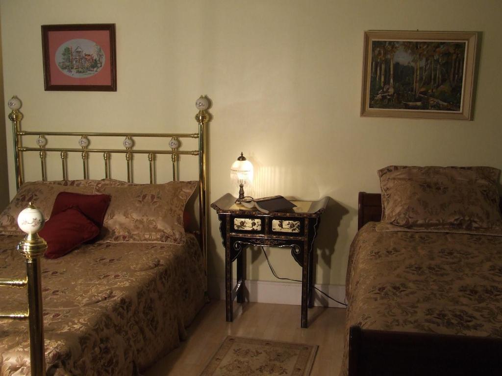 Postel nebo postele na pokoji v ubytování Country Encounters Accommodations