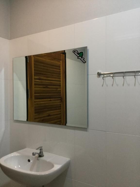 Koupelna v ubytování Chan Place Hotel