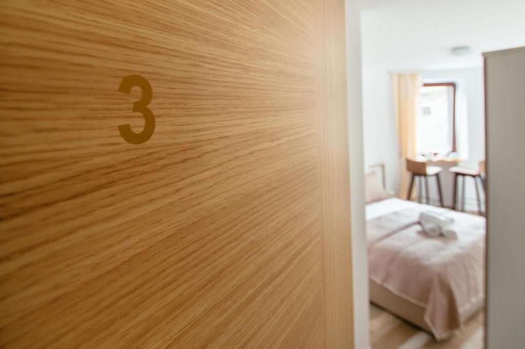 Postel nebo postele na pokoji v ubytování Sunny Rooms