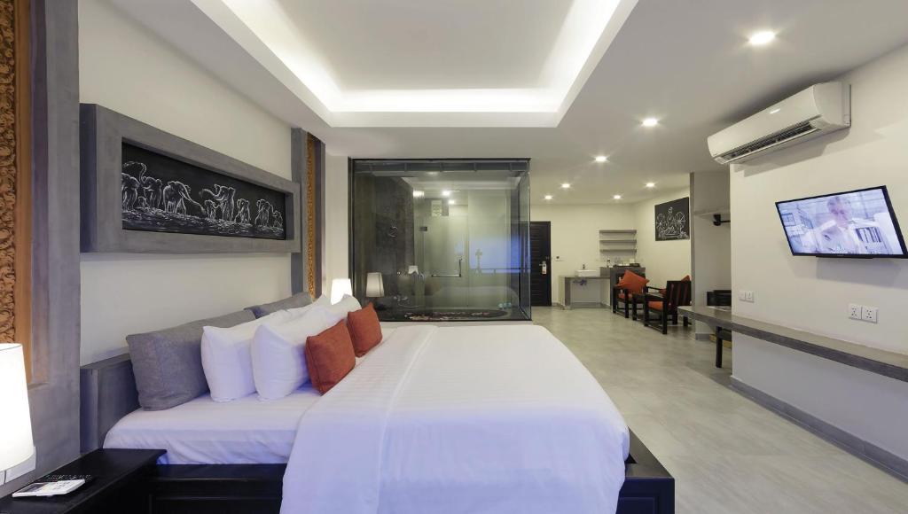 TV a/nebo společenská místnost v ubytování Central Suite Residence