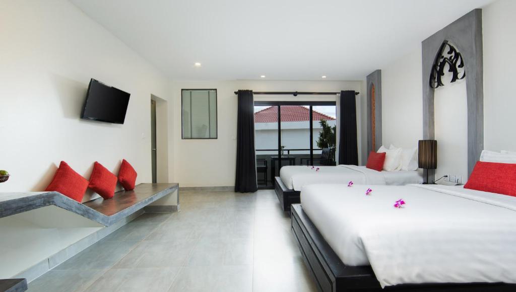 Postel nebo postele na pokoji v ubytování Central Suite Residence