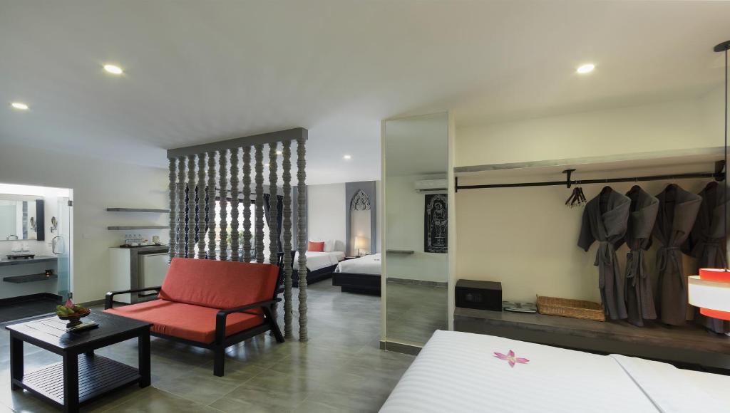Postel nebo postele na pokoji v ubytování Central Suite Residence