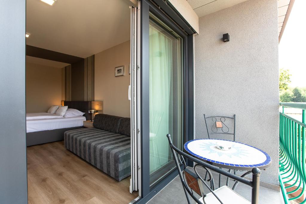 Postel nebo postele na pokoji v ubytování Gostilna in motel Pri Lešniku