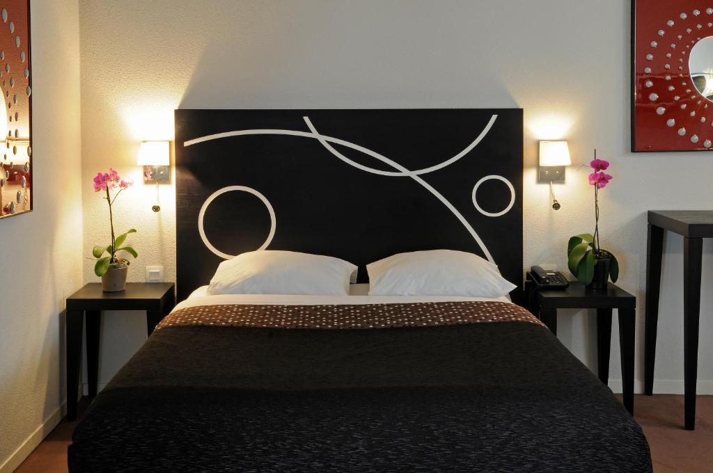 Cama o camas de una habitación en Le Carmin by Popinns