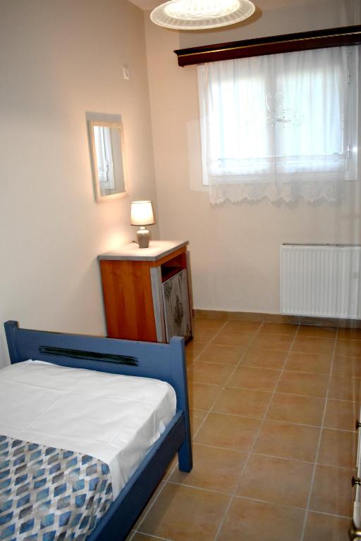 Postel nebo postele na pokoji v ubytování Kakia 2 Bedroom Apartment