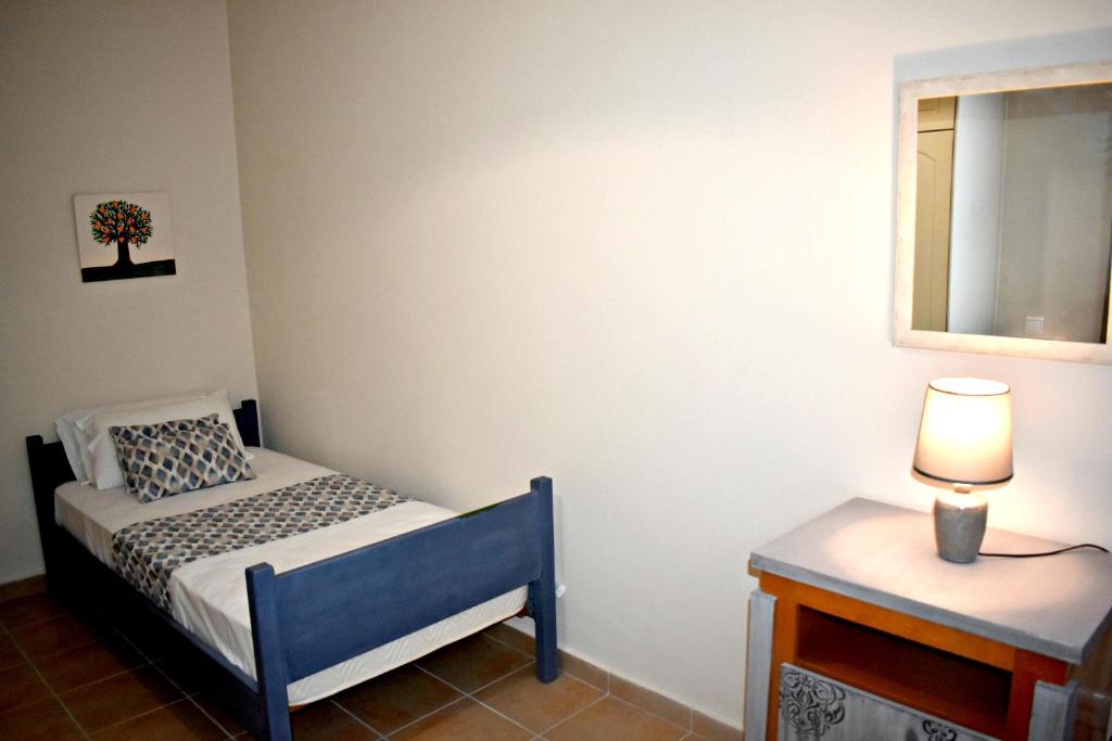 Postel nebo postele na pokoji v ubytování Kakia 2 Bedroom Apartment