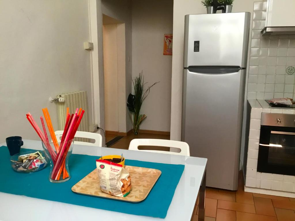 A kitchen or kitchenette at San Firenze Apartment