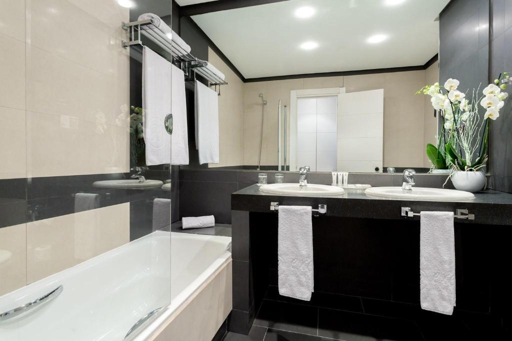 Un baño de Exe Layos Golf
