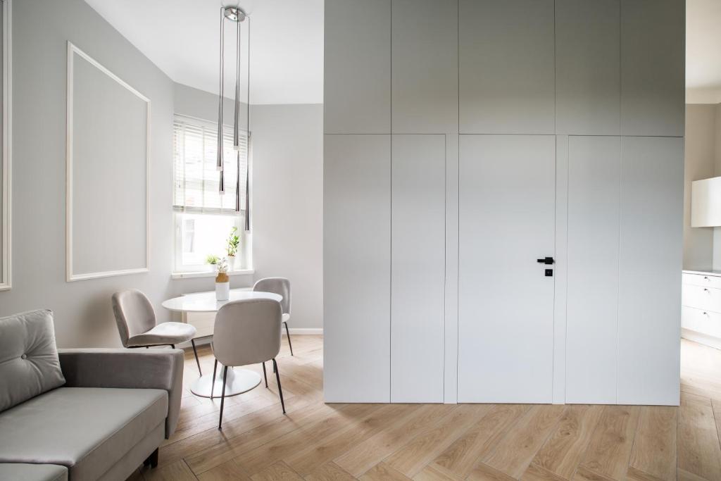 Posedenie v ubytovaní Homewell Boutique Apartments