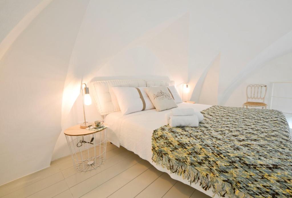 Postel nebo postele na pokoji v ubytování L'Angolo di Ostuni - Home&Terracex4