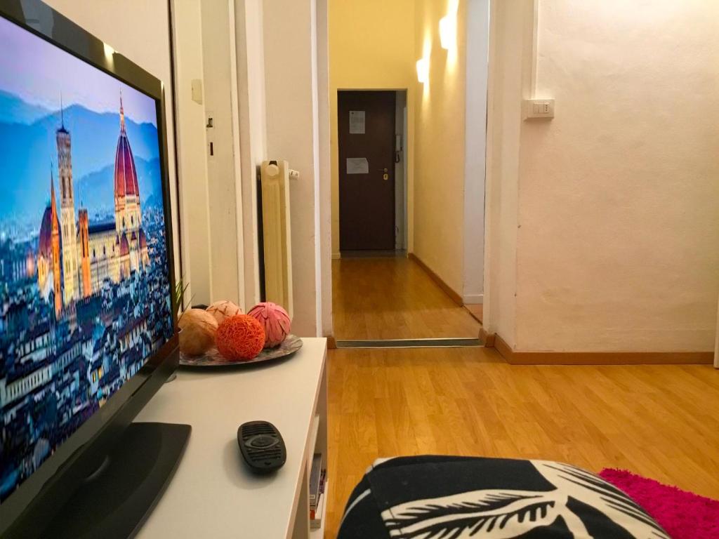 A television and/or entertainment centre at San Firenze Apartment