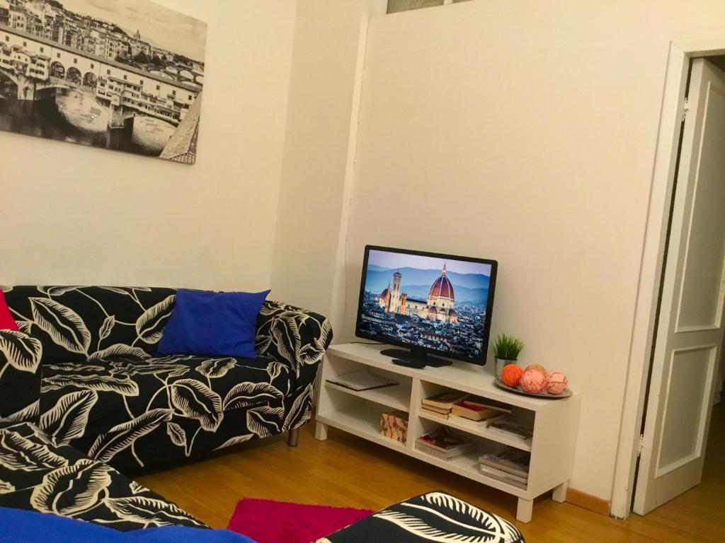 A television and/or entertainment centre at San Firenze Apartment