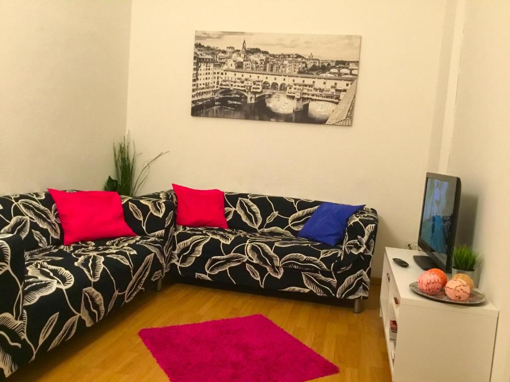 A seating area at San Firenze Apartment