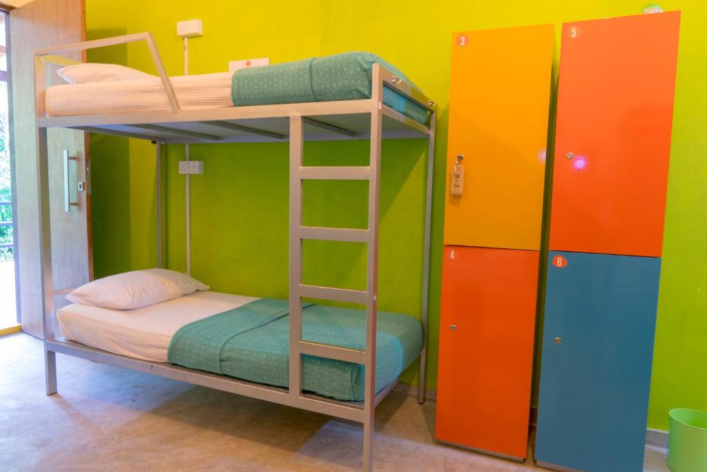 Postel nebo postele na pokoji v ubytování Bunk Station